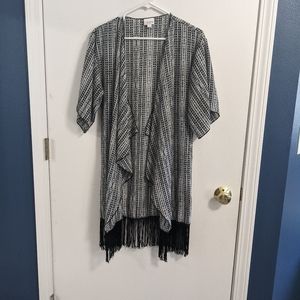 LuLaRoe cardigan. Black/white print. Fringe bottom. Open front. Size Small.